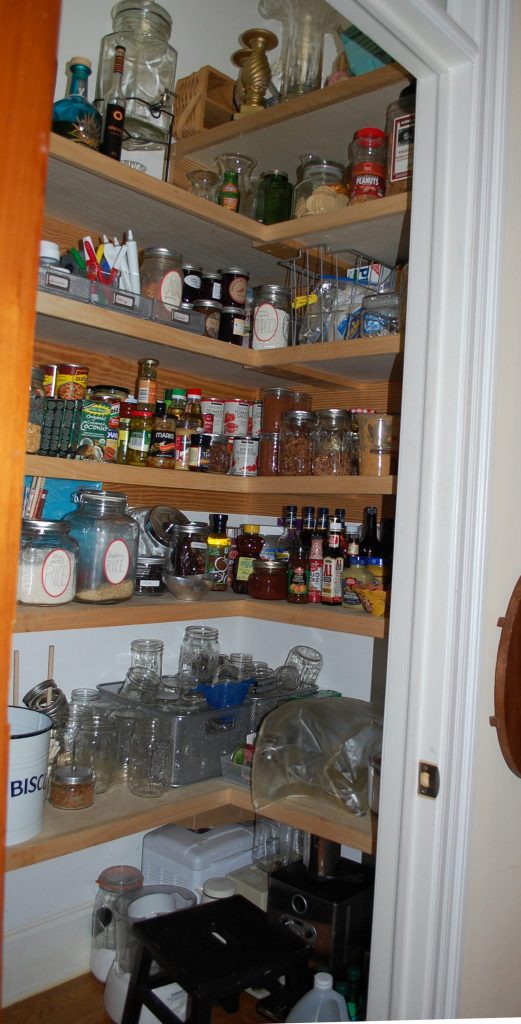 View of pantry organization and contents - staples and canning supplies