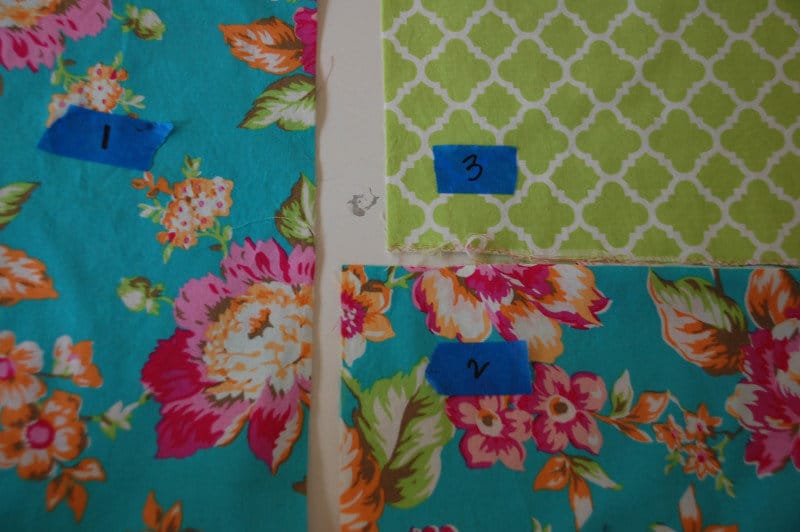 close up of pillowcase fabric pieces before sewing with tape showing numbers for assembly 