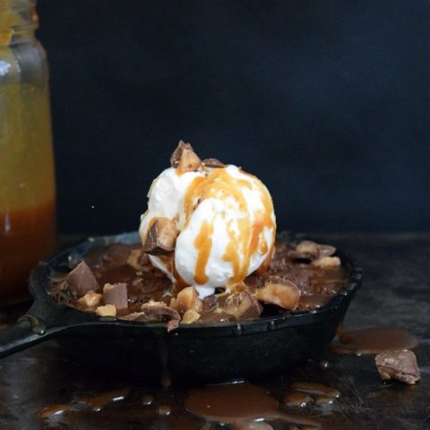 Skillet brownie sundae with a scoop of ice cream.