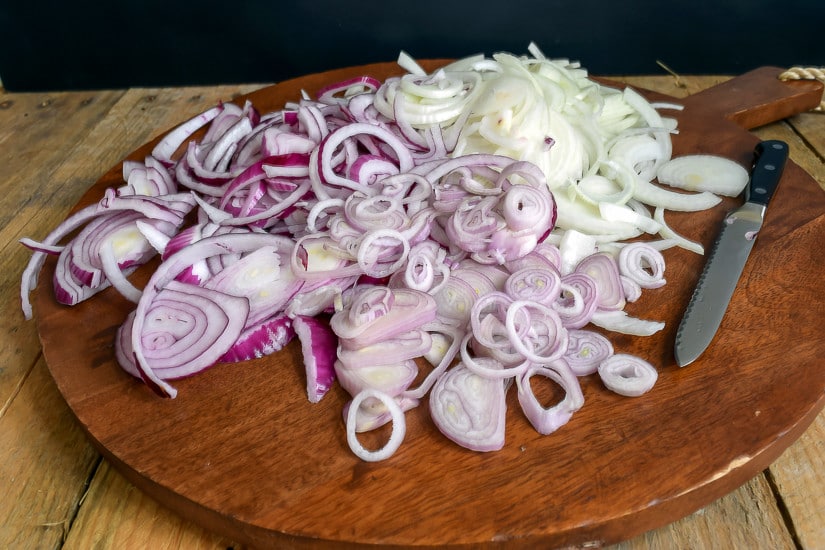 <yoastmark class='yoast-text-mark'></noscript>Savory Onion Jam</yoastmark> Recipe: Red onions sliced for onion jam prep