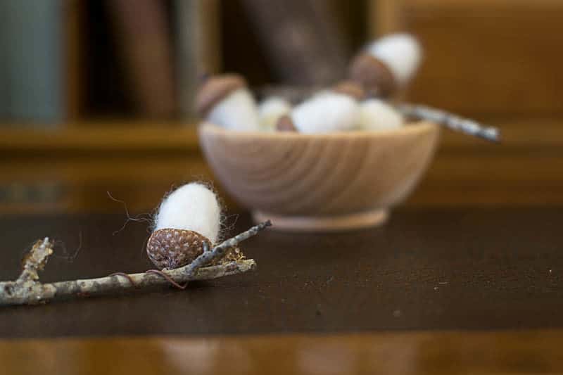 Needle-Felted Acorns in a small wooden bowl.
