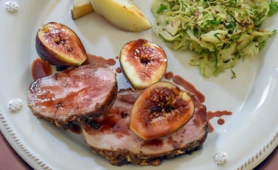 Pork Tenderloin Recipe: Finished dish served with roasted potatoes and shaved brussel sprouts