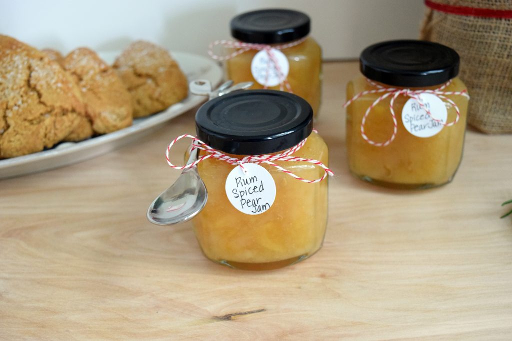 Rum Spiced Pear Jam Recipe: Jars of canned Pear Jam and plate of Gingerbread Scones