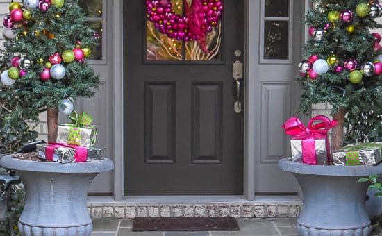 Dress your front porch for the holidays. Instructions and illustrations to make a DIY Ornament Garland with plastic ornaments, coiled wire and florist wire.