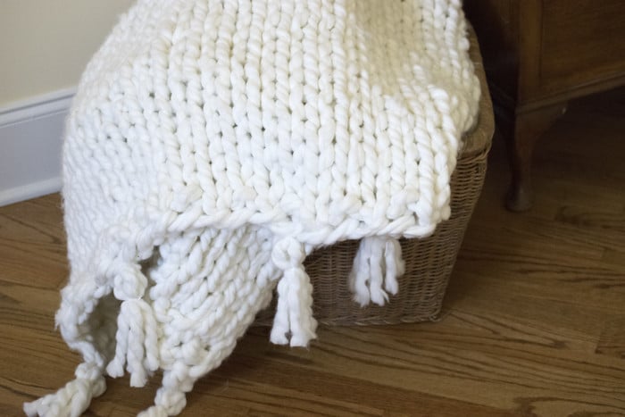 Looking for a quick, home decor diy craft? This thick, chunky blanket was knit in one day, with some unusual knitting needles!