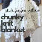 holding chunky knit blanket