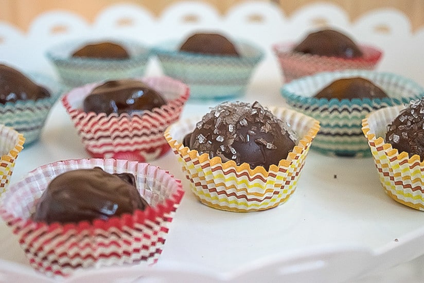 DIY chocolate truffle recipe: close-up of finished truffles in candy wrappers