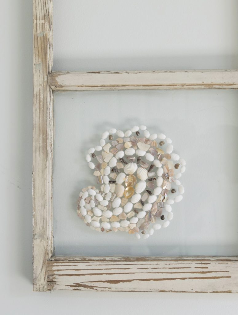 Window with shells glued on.