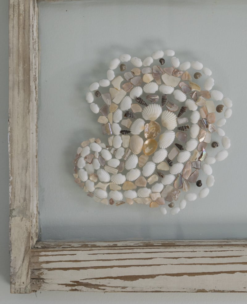 Use an upcycled window frame to make art. An easy DIY project for your home decor.