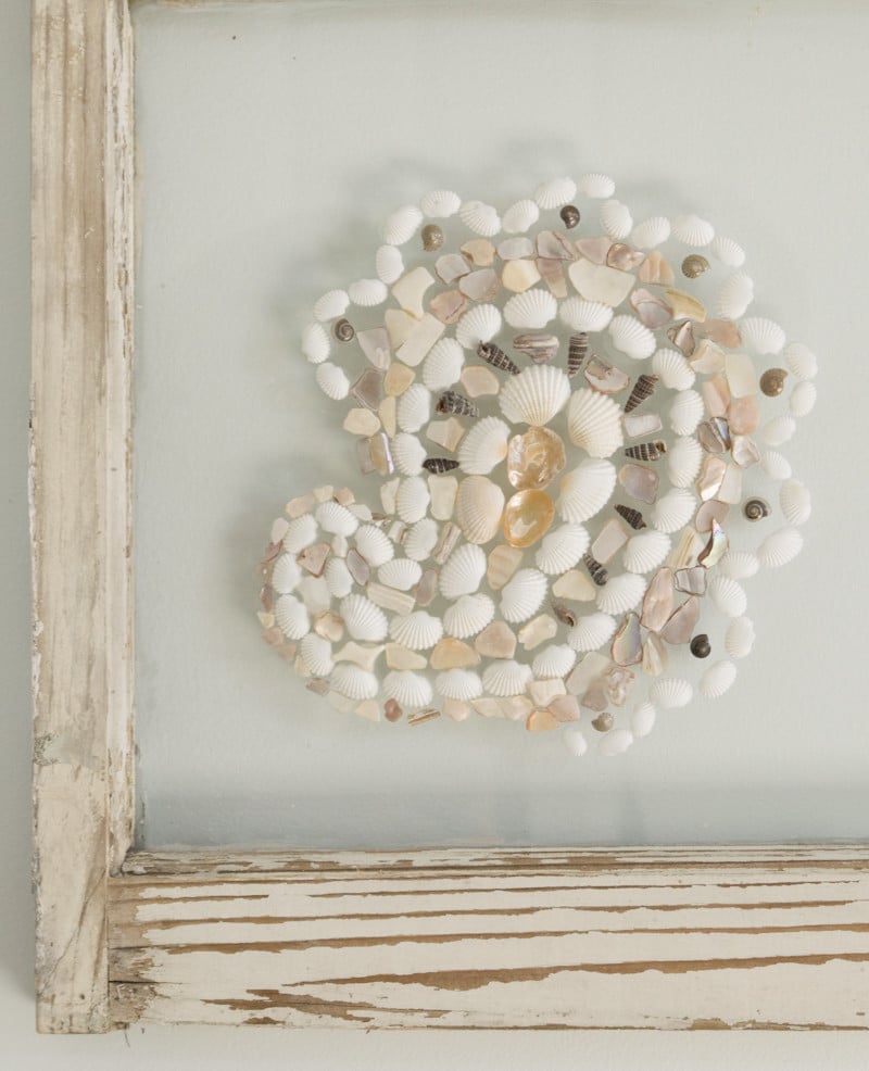 Use an upcycled window frame to make art. An easy DIY project for your home decor.
