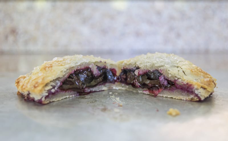 A recipe for the perfect hand pie, with a delicate and flaky crust that is sturdy enough to hold the delicious blueberry filling. Tips for perfect hand pies