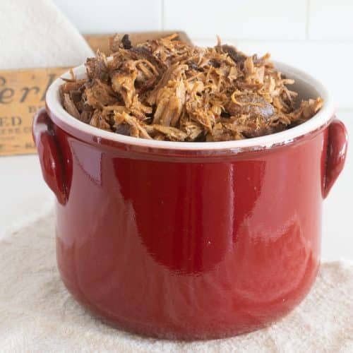 A pot of crock pot barbecue pulled pork.