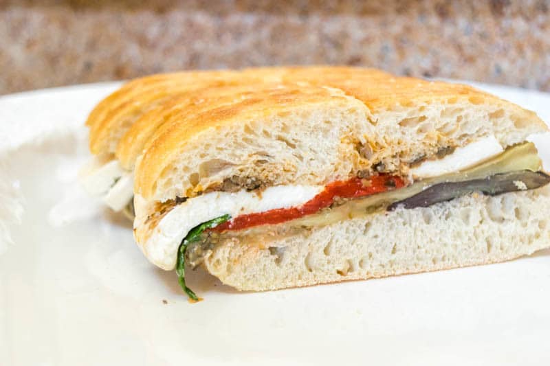 Recipe for a easy to assemble, make ahead Pressed Mediterranean Vegetable Sandwich. Perfect for entertaining and picnics.