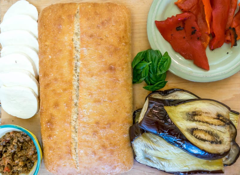 Recipe for a easy to assemble, make ahead Pressed Mediterranean Vegetable Sandwich. Perfect for entertaining and picnics.