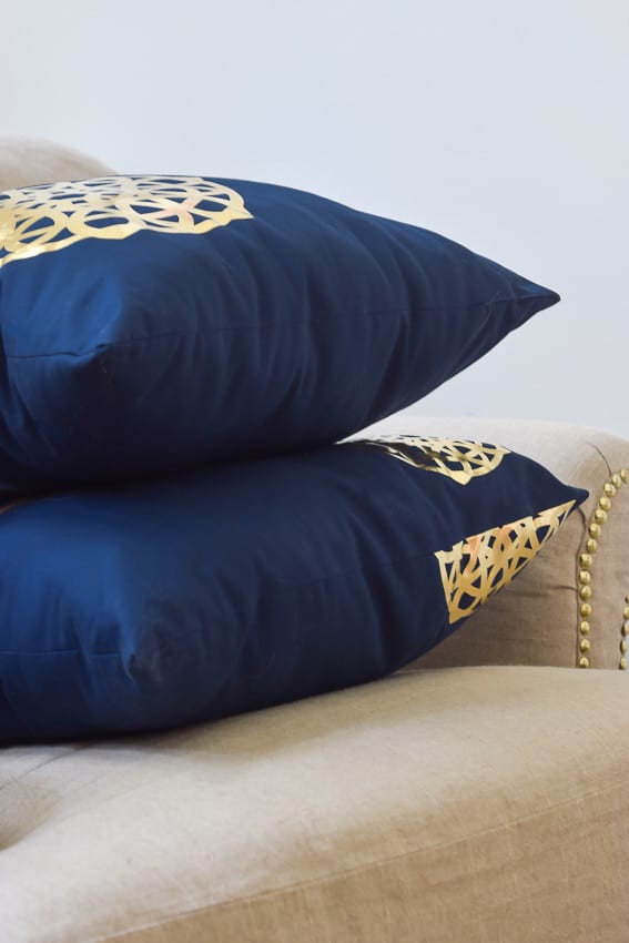 Cricut and it's Iron-On Gold Foil were all I needed to make these spiffy gold medallion pillows. These easy DIY pillows are the perfect addition to jazz up my home decor.