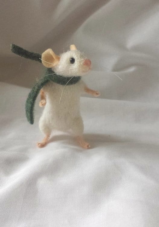 Small needle-felted mouse.