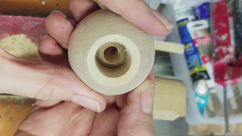 drilled holes in wooden balls