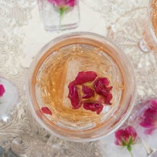 Easy to make rose-infused simple syrup and rose ice cubes make a glass of Prosecco something extra special. Rose Prosecco cocktail will be perfect for a special event, a girl's night or just a lovely Friday evening sip.
