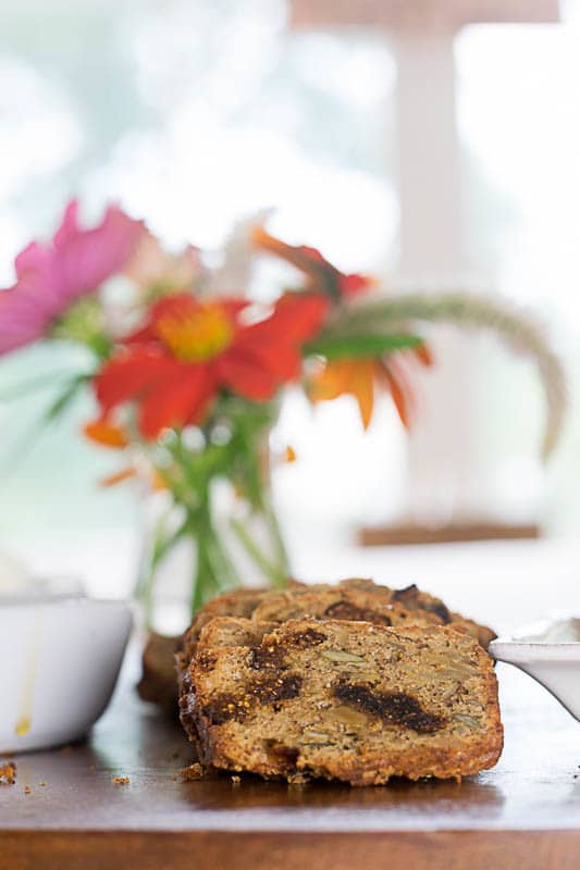 Gluten Free Bread Recipe: Slices of Rosemary, Fig and Nut Bread on a serving tray