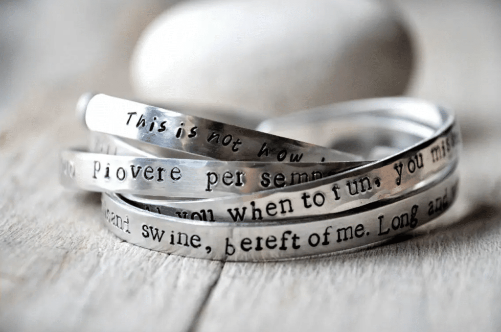 Book quotes on bracelet.