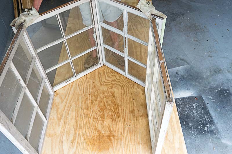 DIY Cold Frame: line up frame to determine where to outline on plywood