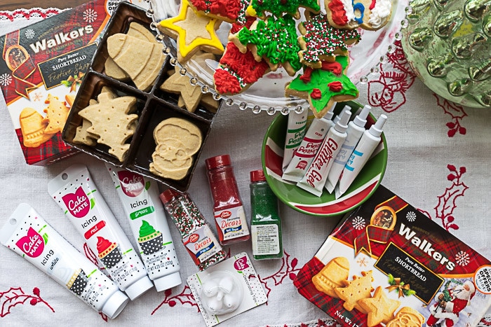 Christmas cookie decorating kit: cookies, icing, sprinkles and finished Christmas cookies