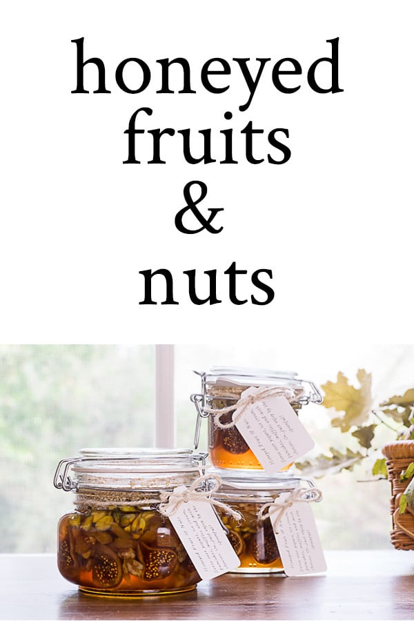 glass jar, dried fruits and nuts are drenched in sweet honey