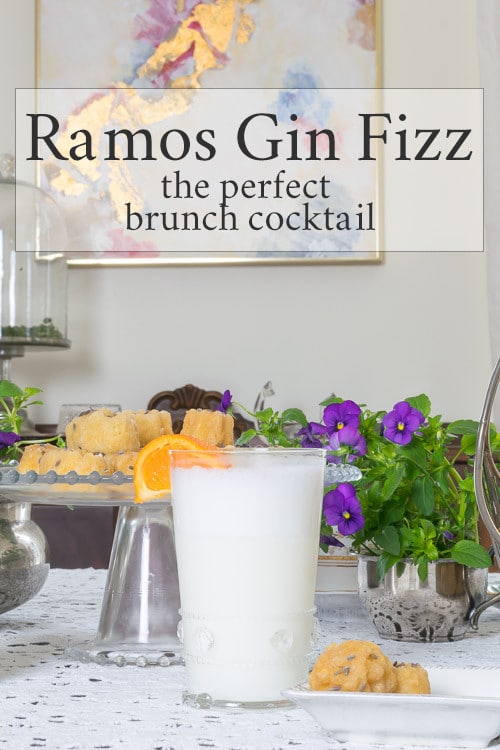 pin showing ramos gin fizz with orange slice