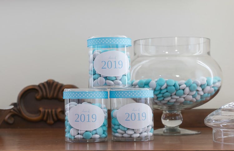 Blue and White M&Ms in an apothecary jar.