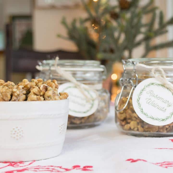 Roasted Walnuts with Rosemary in a bowl and in jars with tags