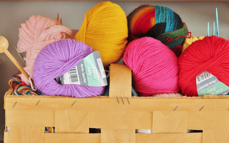 Balls of yarn to sort through using the Craft Room and Office Declutter Checklist