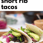 chile braised short rib tacos on plate