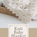 cloverleaf eyelet stitch knit baby blanket in box with rattle