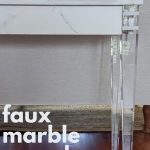 closeup of faux marble console table