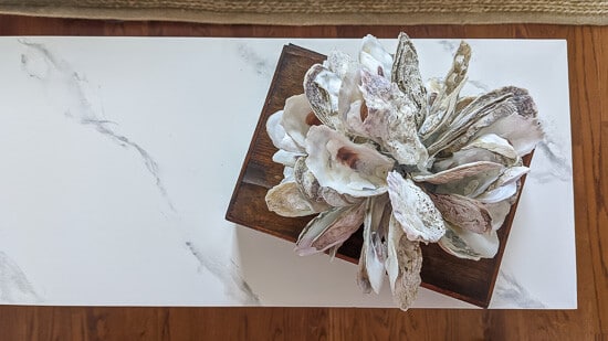 Overhead shot of faux marble on console table.