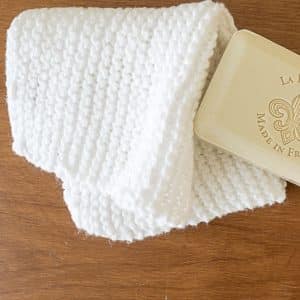 garter stitch washcloth and a bar of soap