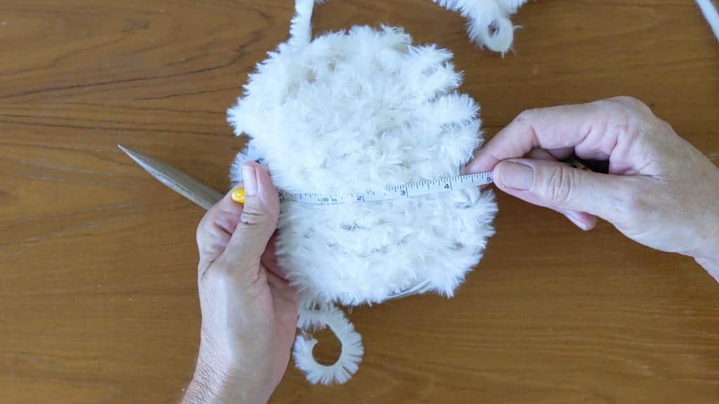 How to knit a Christmas Stocking: Measuring faux fur cuff on Knit Christmas Stocking Pattern