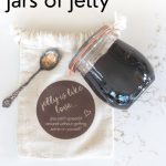Jar of jelly, spoon and gift bag for giving the jelly