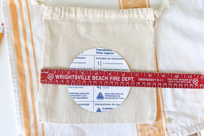 Use a ruler to center your label on the bag