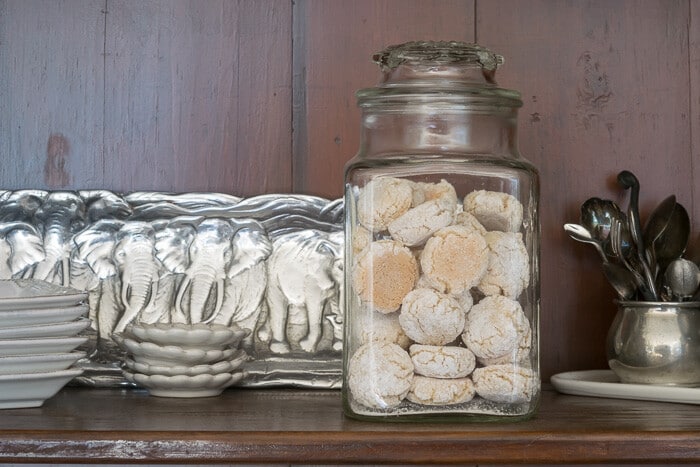 Clear glass jar filled with almond cookies