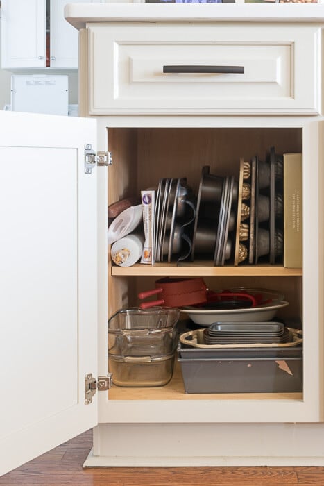 This cabinet holds my bread pans, cupcake tins, etc...