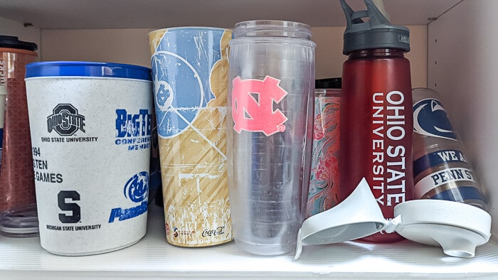 Tackling water bottle/travel mug storage is one of the kitchen organization ideas.