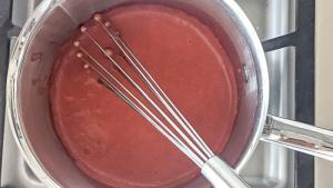 Cooked and thickened strawberry puree.