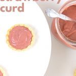 Overhead shot fo strawberry curd in small tarts