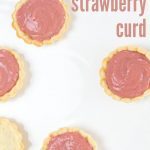 Overhead shot fo strawberry curd in small tarts