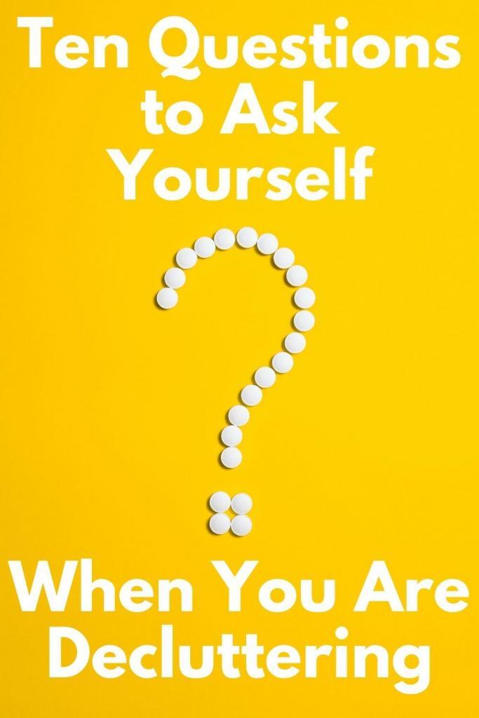 A White Question Mark on a Yellow Background.