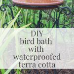 Waterproofed Terra Cotta Bird Bath filled with water.