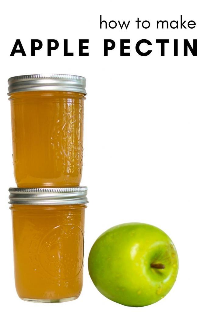 Two jars of apple pectin stock and a green apple.