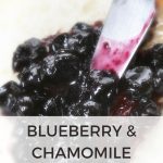 spreading blueberry chamomile jam on a piece of bread