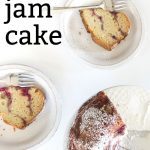 Overhead shot of 2 slices of Strawberry Jam Cake, with the rest of the cake on a cake stand.
